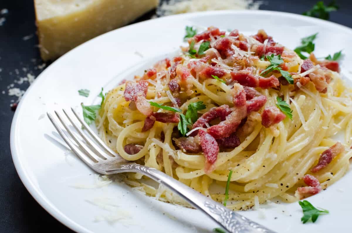 Pasta Carbonara. Spaghetti with bacon, parsel and parmesan cheese.