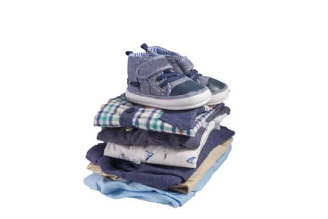 stack of kids clothes