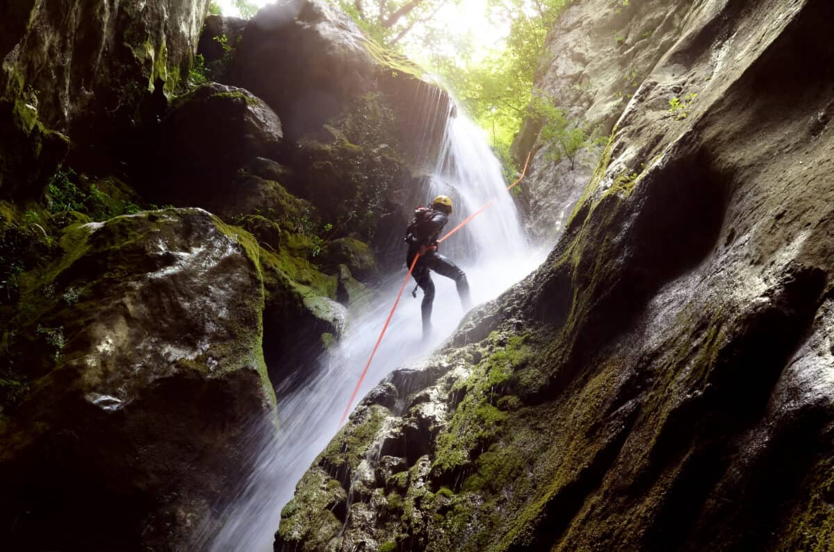 rappeling on waterfall