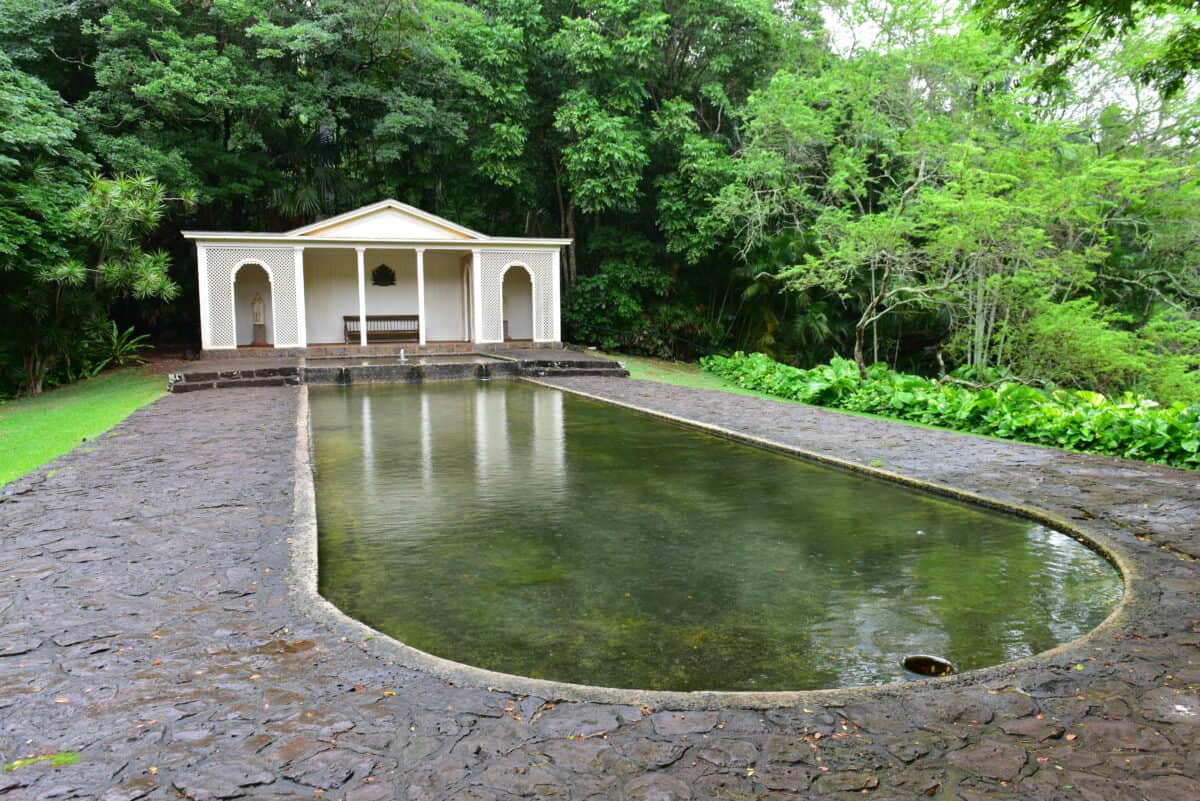 Reflecting pool in the Diana Room of Allerton Garden in Kauai, Hawaii