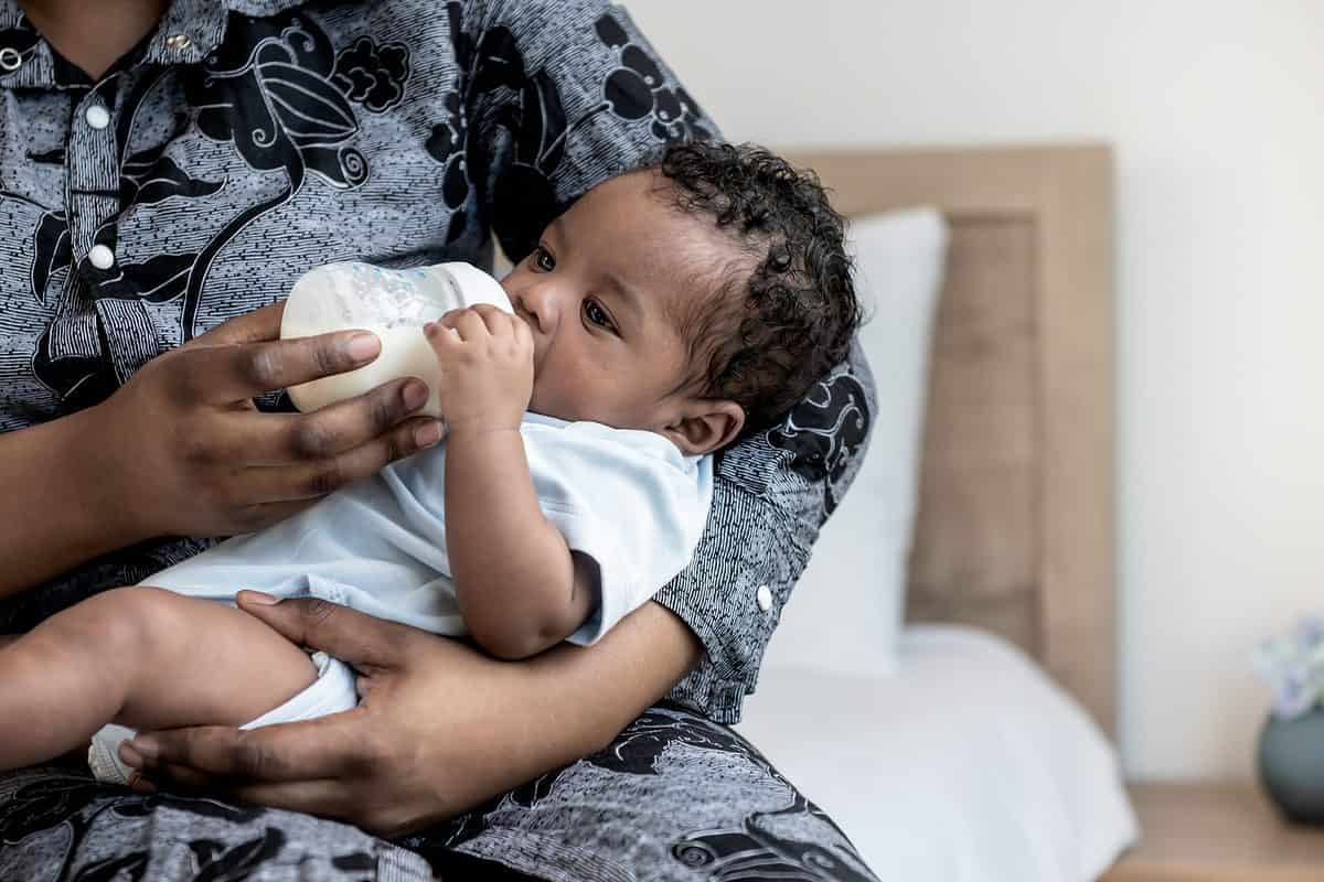 baby drinking from bottle