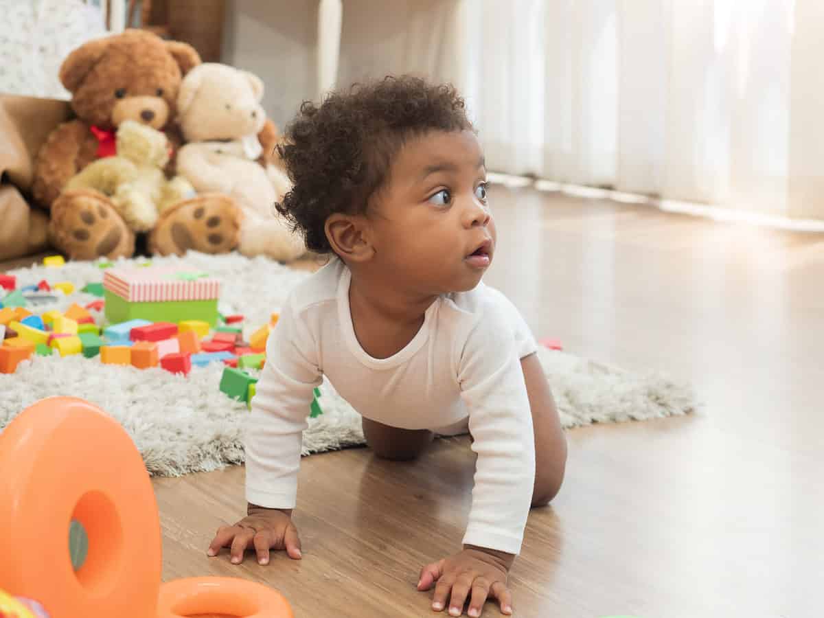 baby crawling on floor