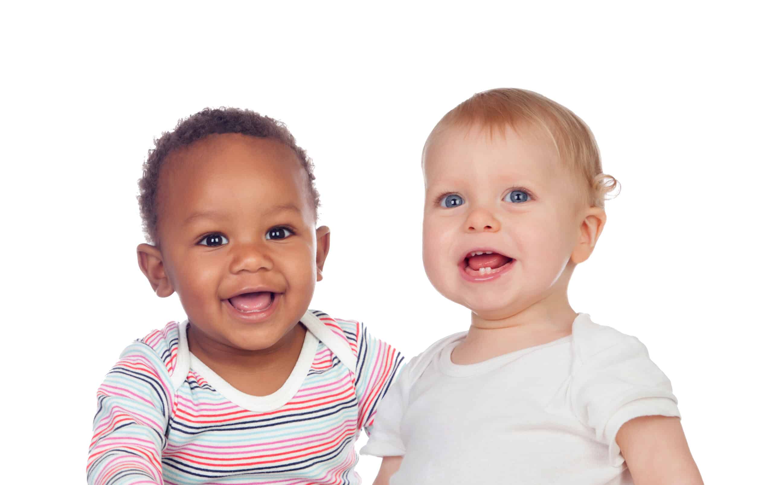 Couple of Babies African and Caucasian laughing on white background