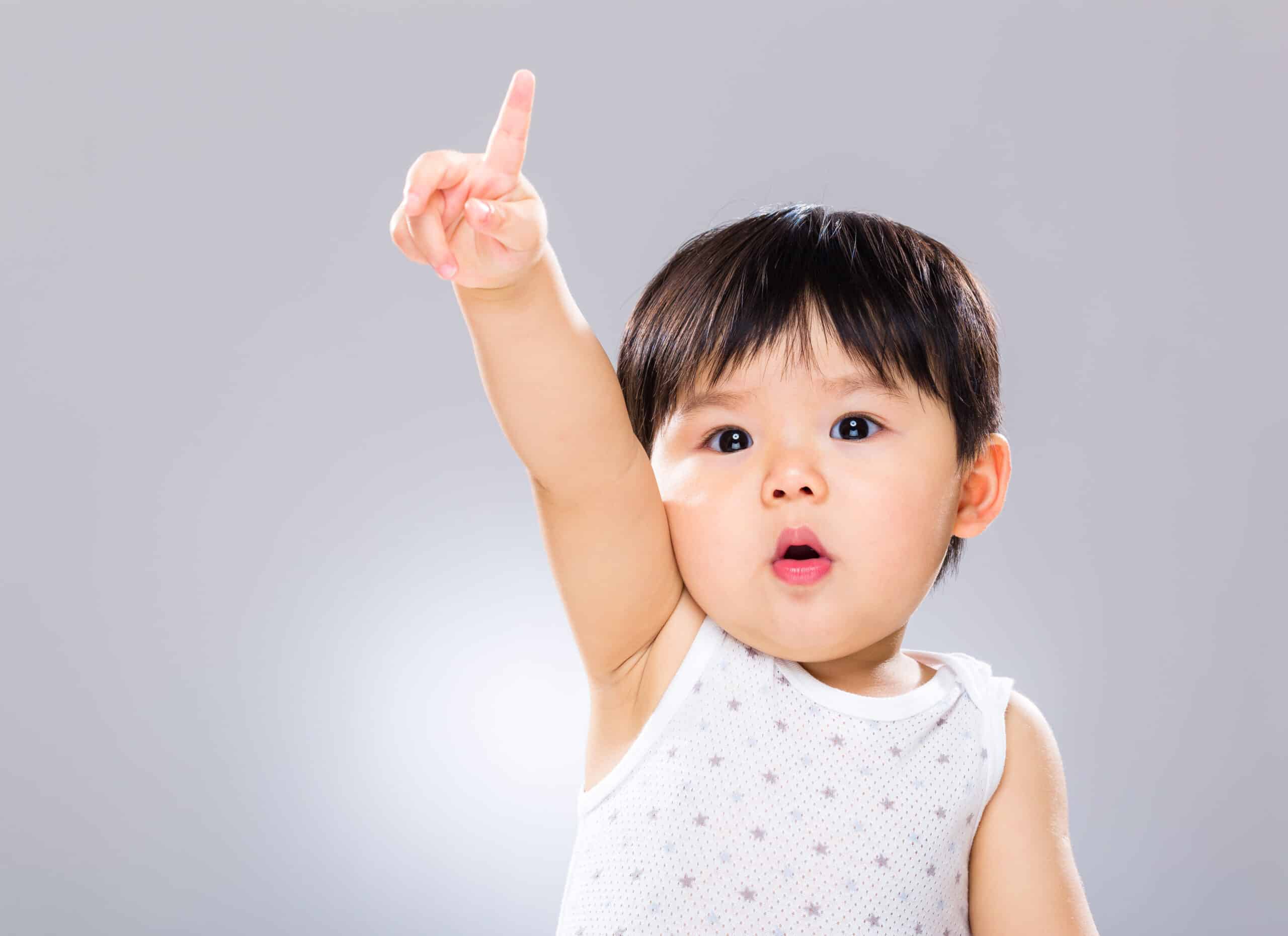 Adorable boy hand raised up