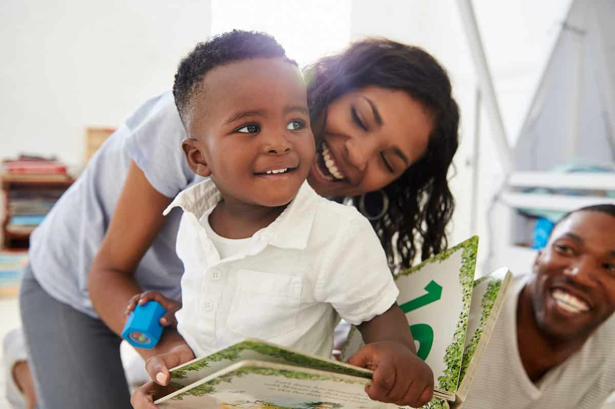 18 month old with book