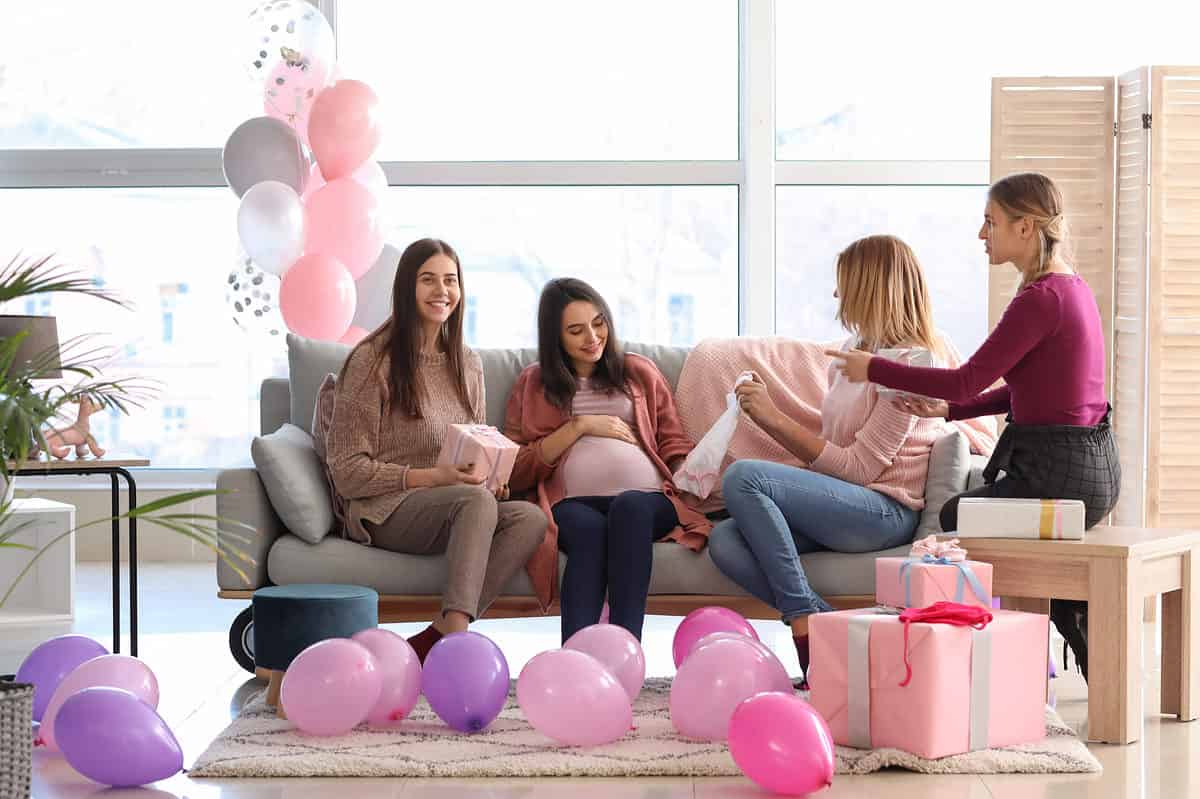 Women on couch at baby shower