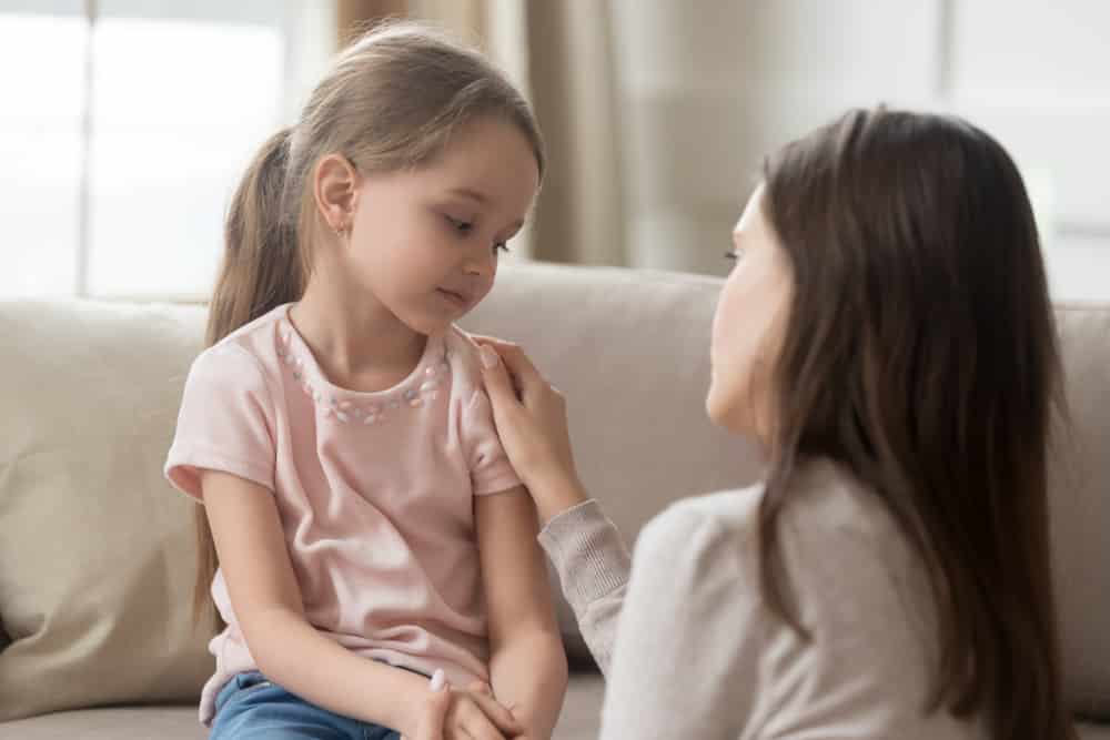 Child talking with mother