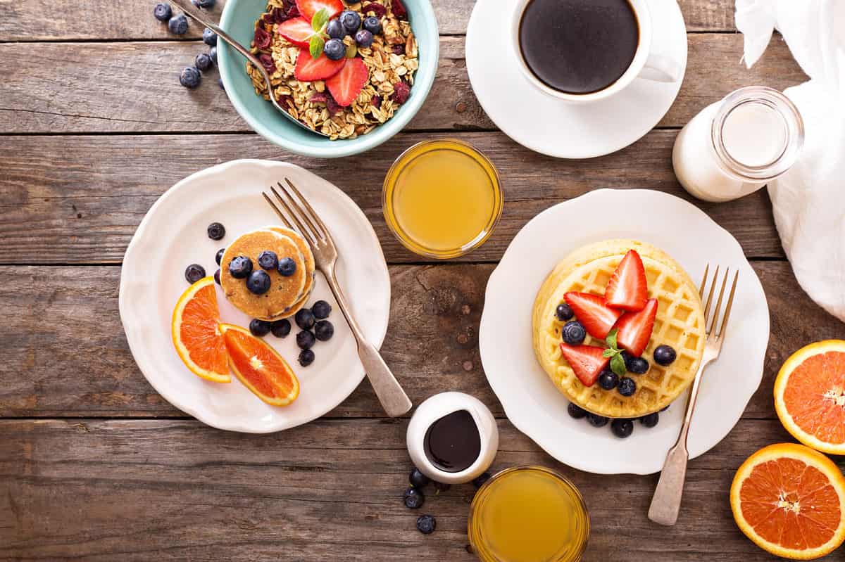 Breakfast foods and drinks on a table