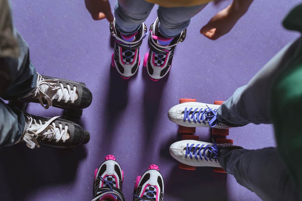 Partial,View,Of,Family,In,Roller,Skates,Standing,On,Roller