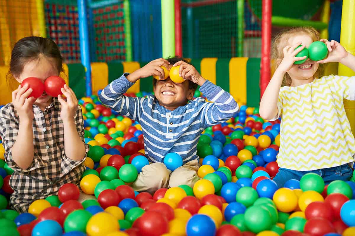 Portrait,Of,Three,Funny,Little,Kids,Playing,In,Ball,Pit
