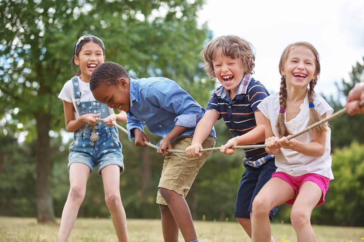 Children playing tug-of-warThese out-of-the-box trivia questions are a blast to ask!