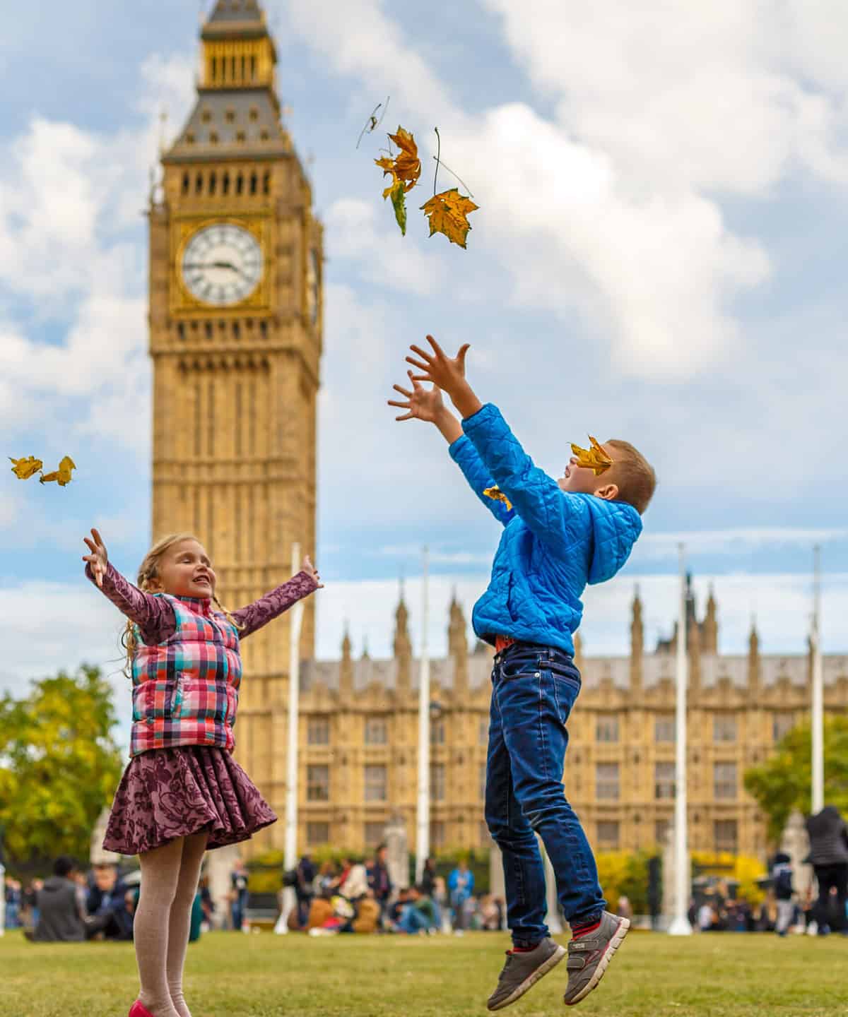 Boy and Girl outside of Big Ben in London 