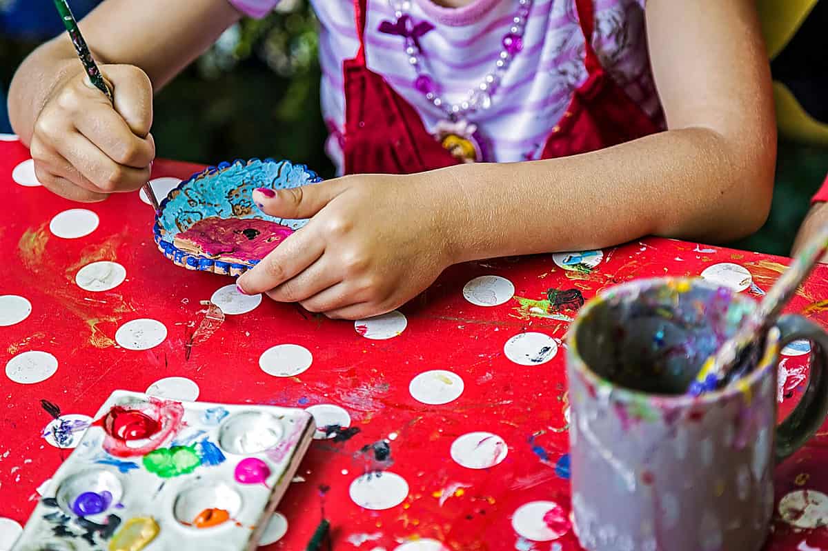 Children,Painting,Pottery,At,A,Workshop,Organized,By,The,International