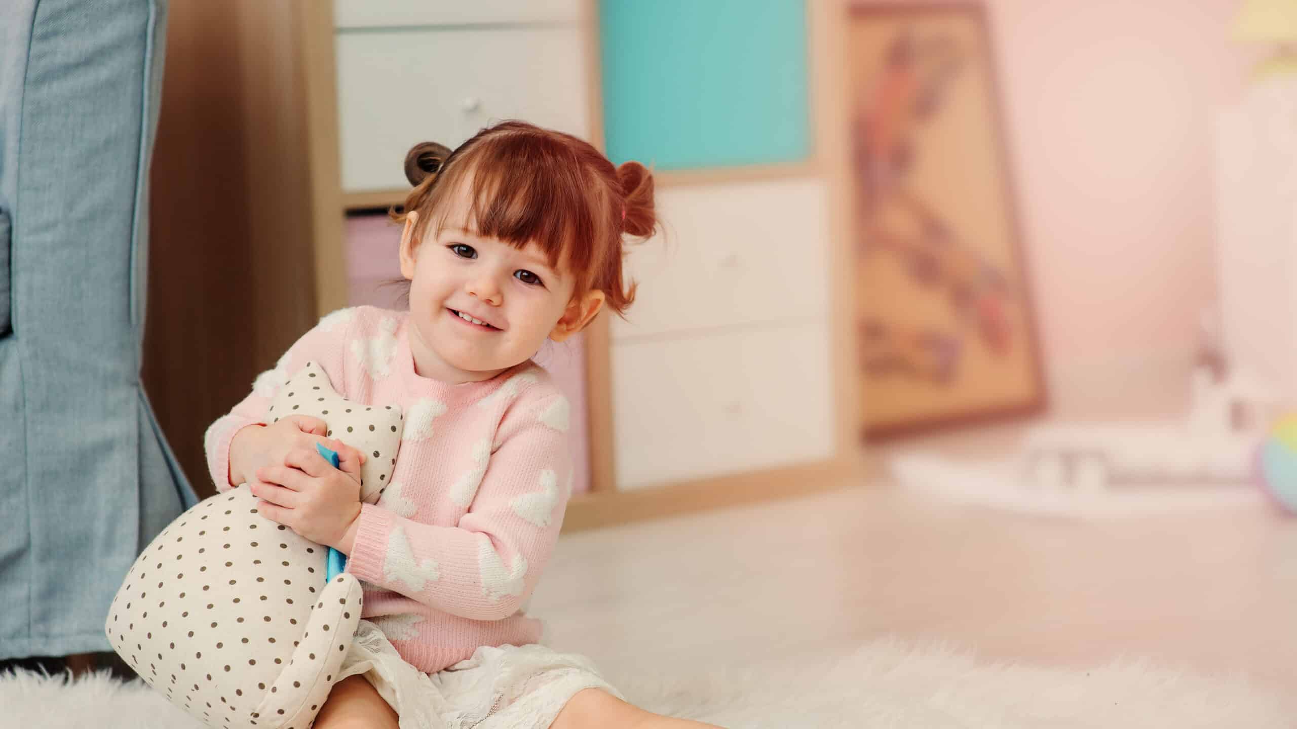 2-year-old girl sitting down