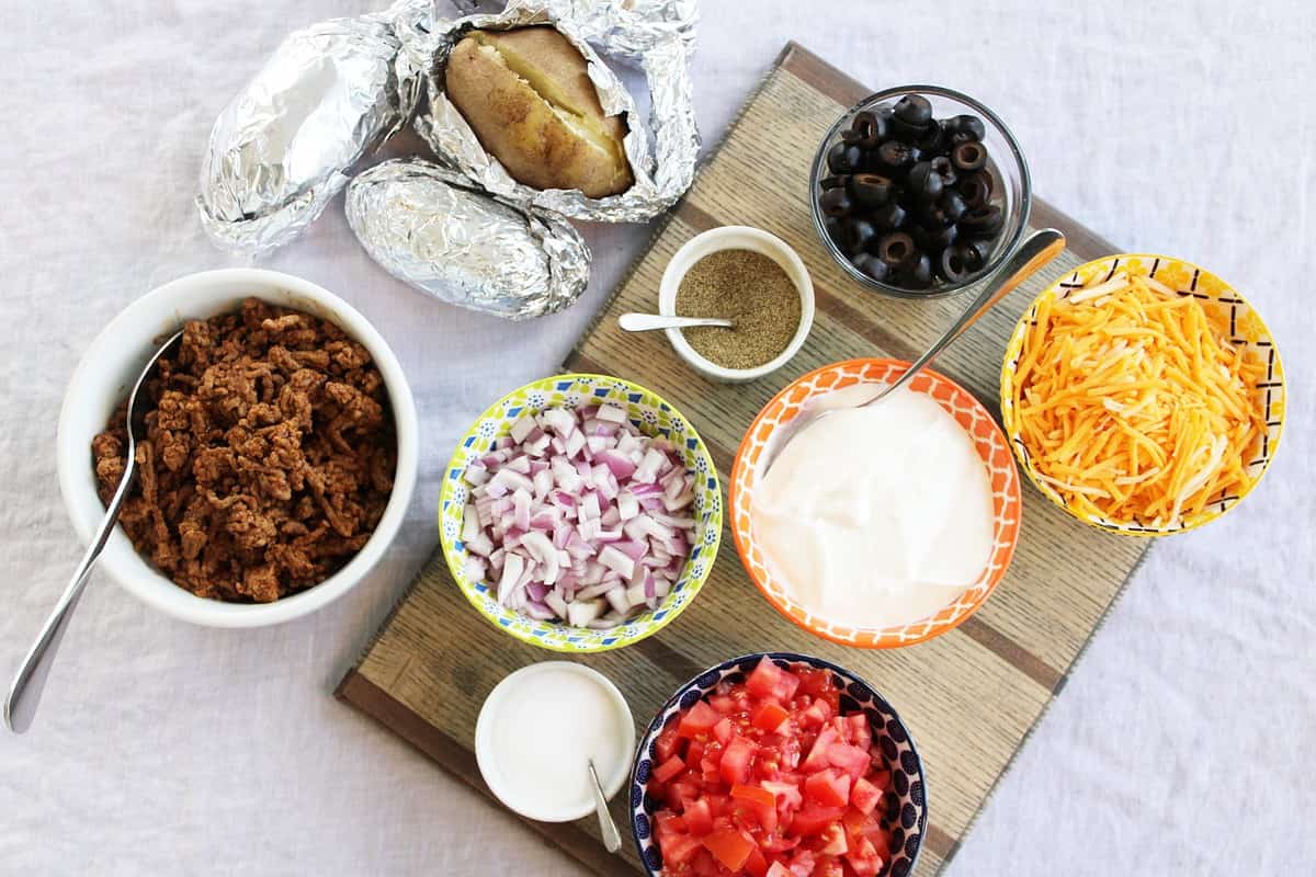 50 BEST Cheap Toppings for a Baked Potato Bar • Faith Filled Food