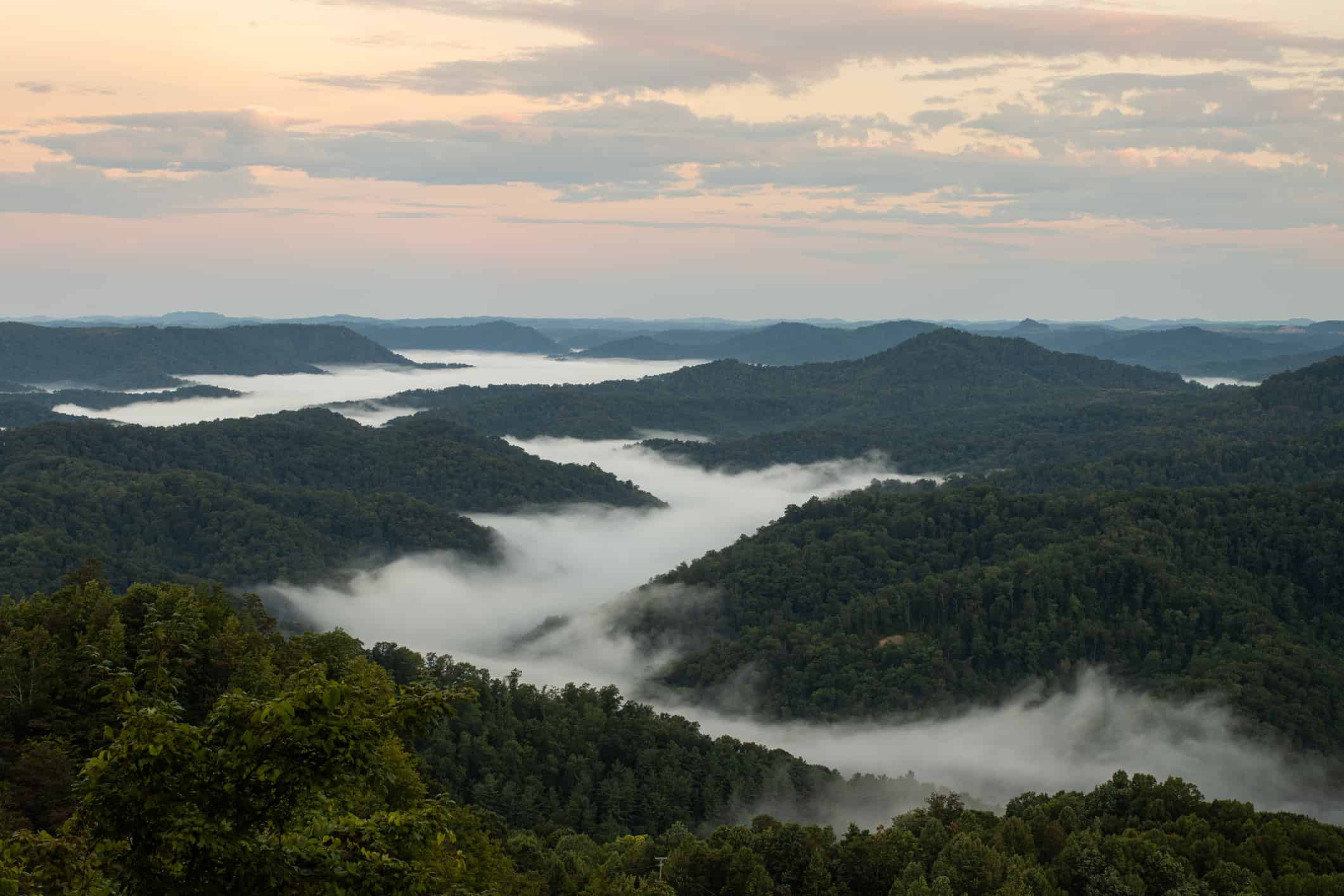 Early morning fog hovers in the valleys in Central Appalachia.