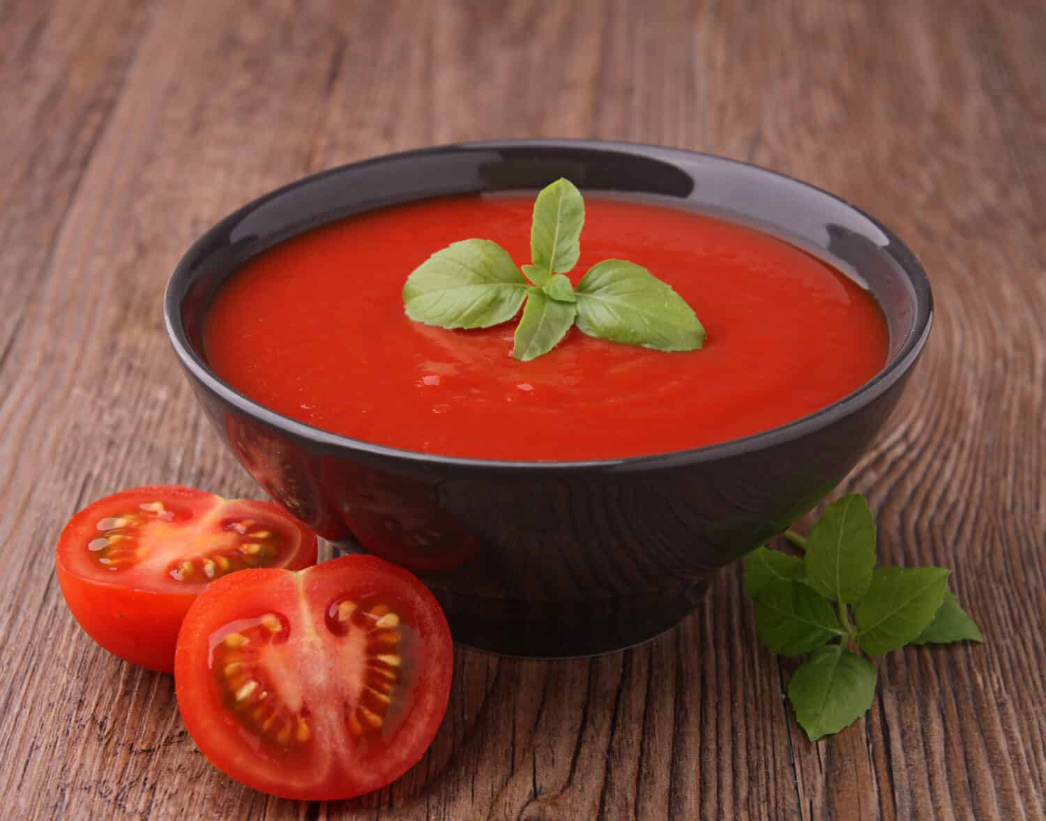 bowl of tomato with basil