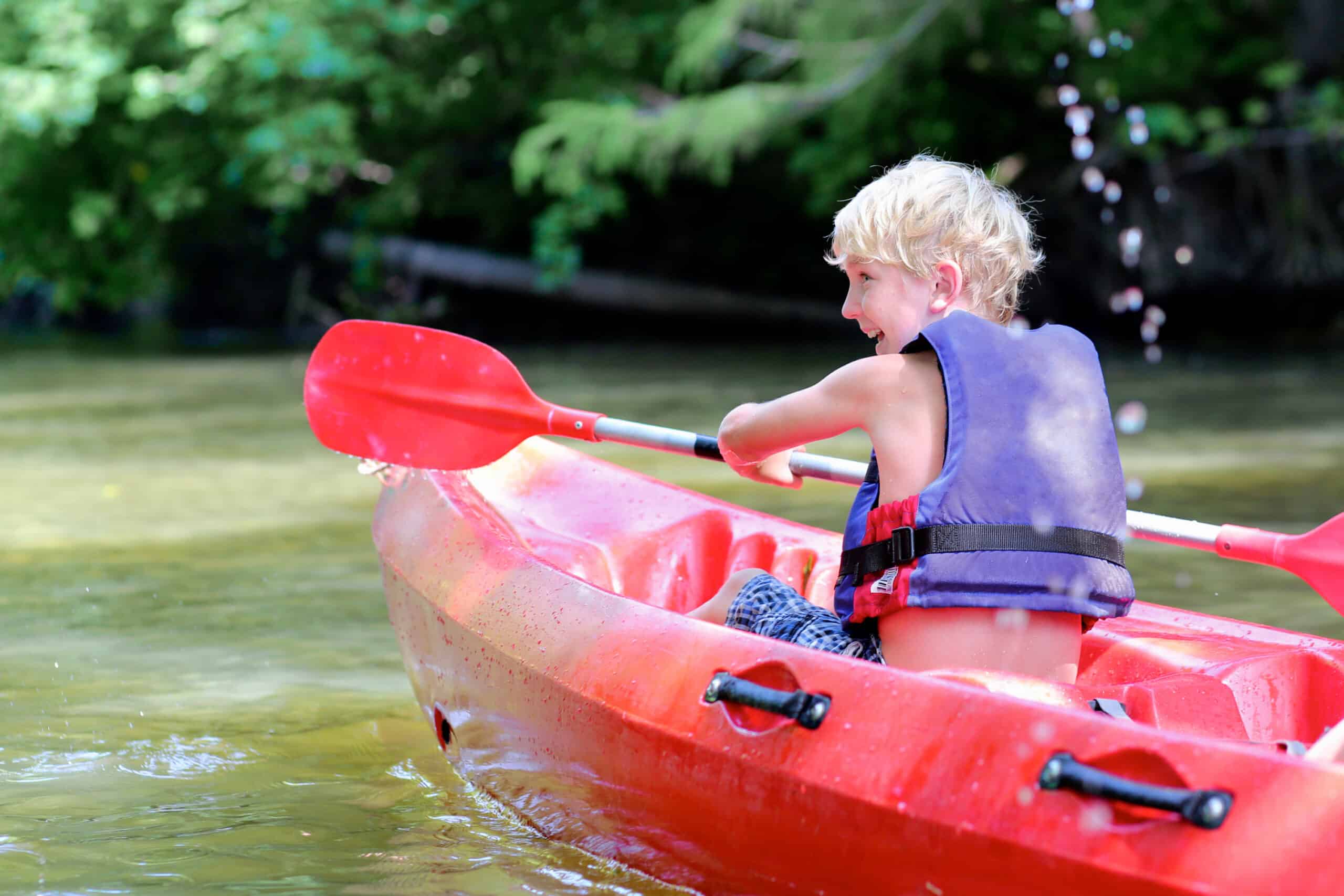 summer camp kayak kid