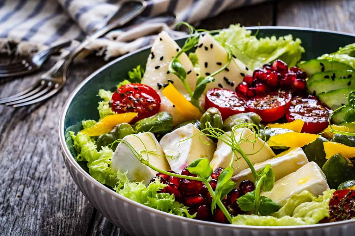 Tasty,Salad,-,Leafy,Greens,,Camembert,,Pear,,Pomegranate,,Cherry,Tomatoes