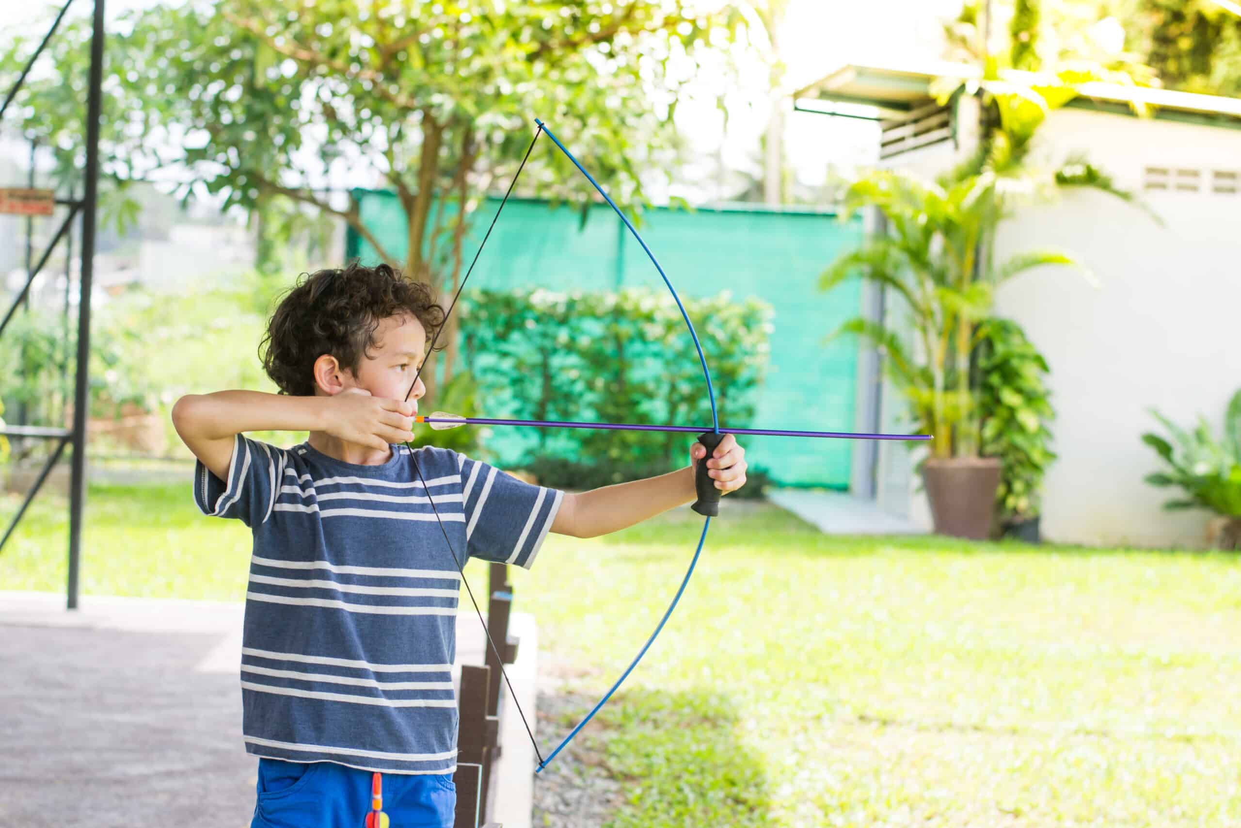 boy shooting archery