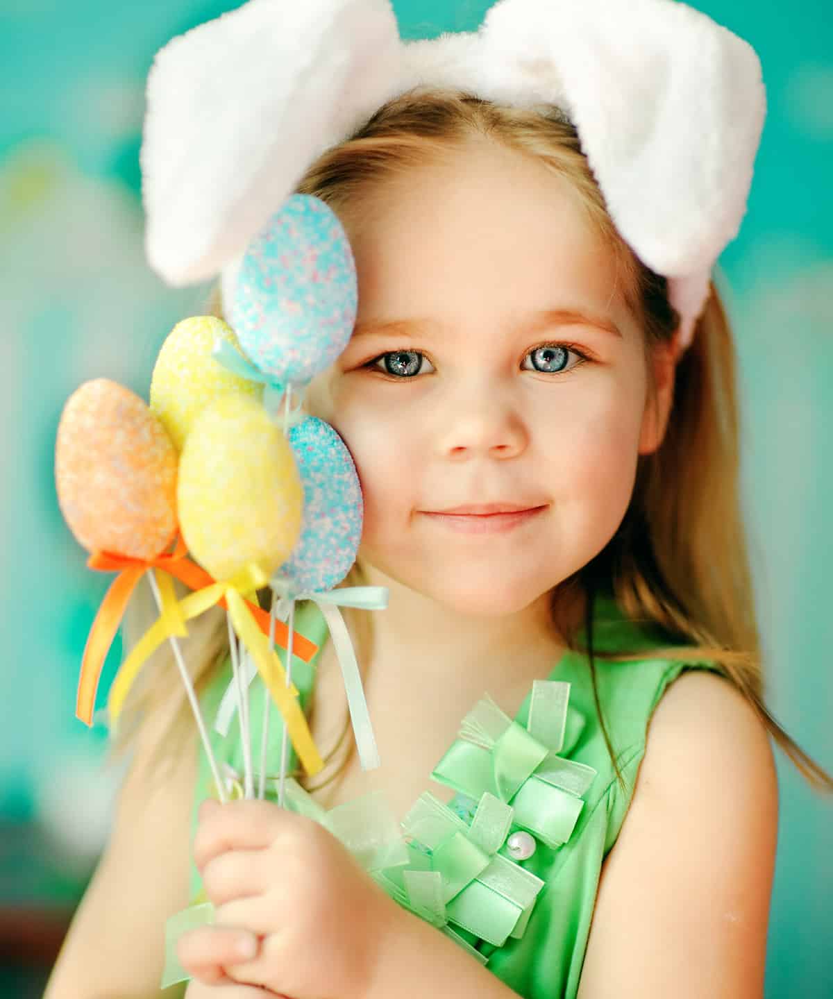 Little girl holding Easter treats