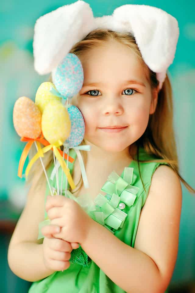 Little girl holding Easter treats