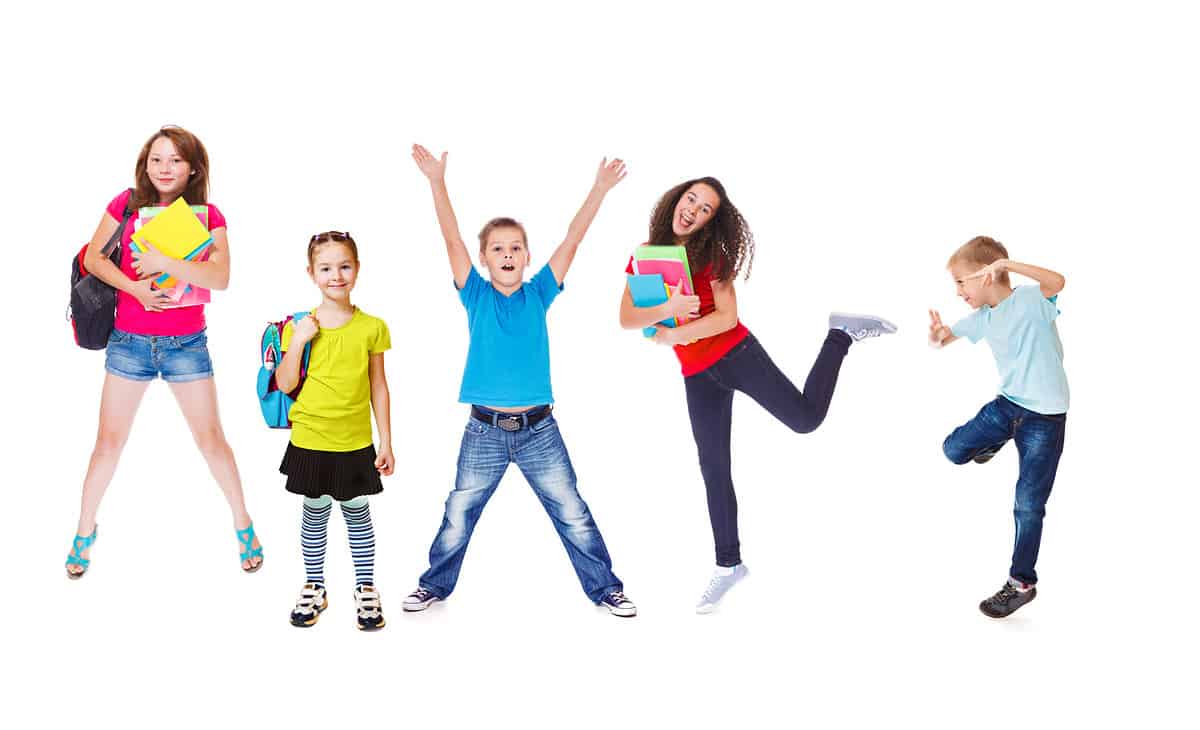 Photo of elementary school pupils posing differently.