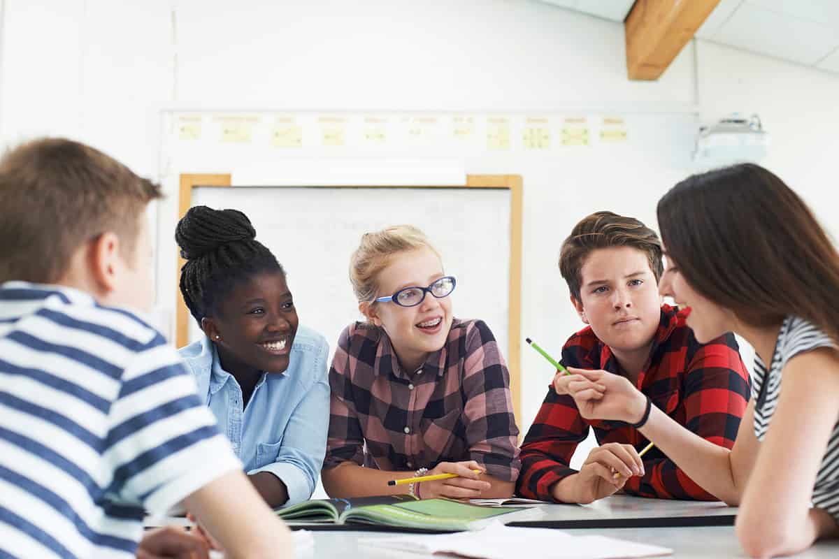 Students having a round table discussion.