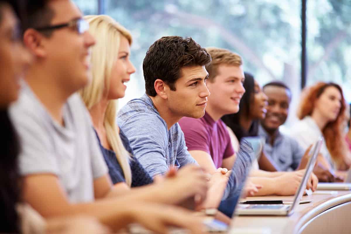  Photo of university students listening to a fascinating lecture.