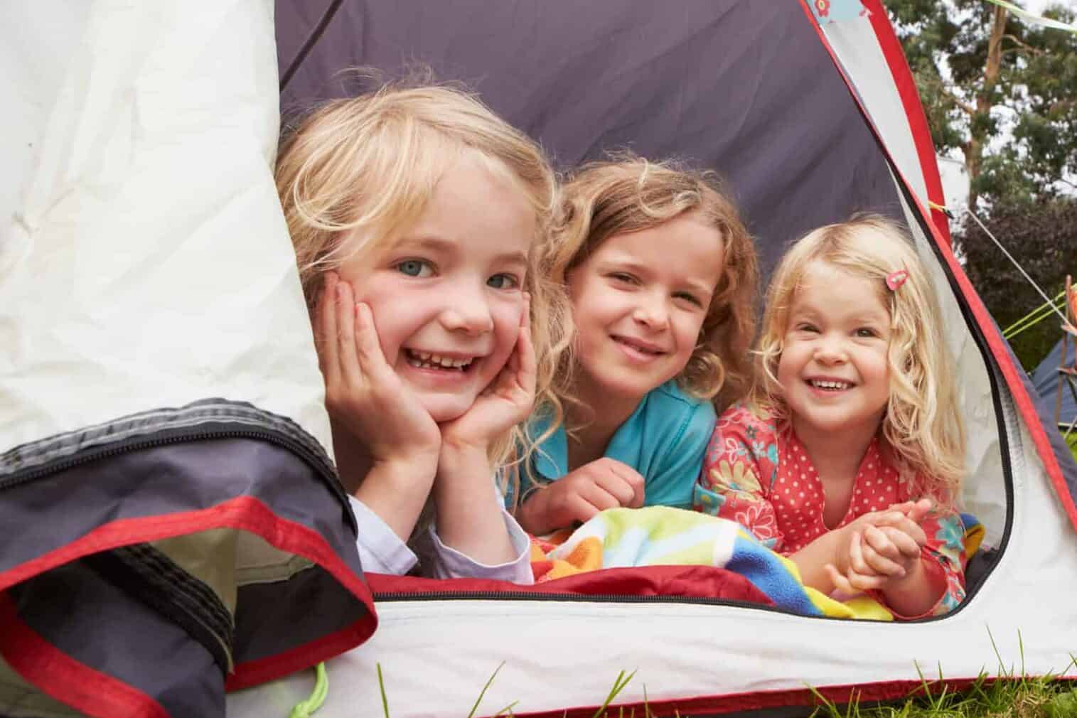 family camping trip with adults and children