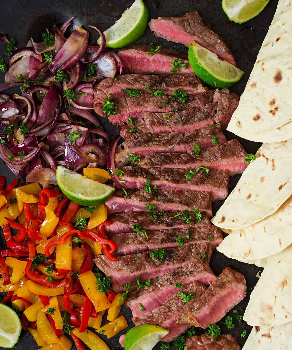 Mexican fajitas for beef steak and grilled vegetables. Top view