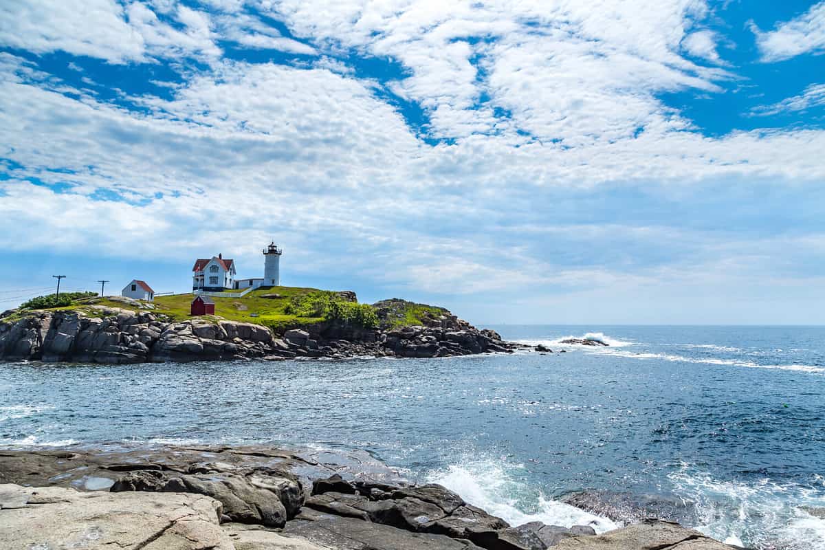 The Cape Neddick Light stands on Nubble Island about 100 yards off Cape Neddick Point. It is commonly known as "Nubble Light" or simply "the Nubble".