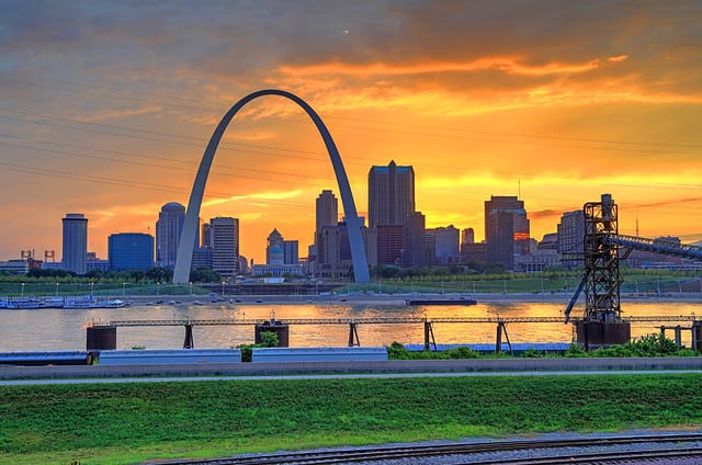 Sunset over the Gateway Arch and St. Louis, Missouri.