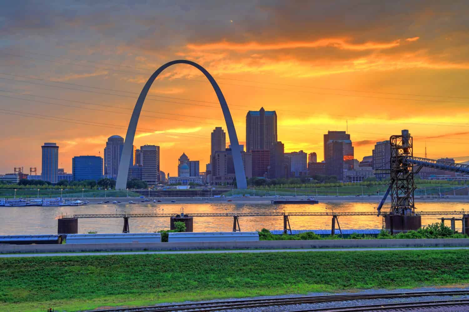 Sunset over the Gateway Arch and St. Louis, Missouri.