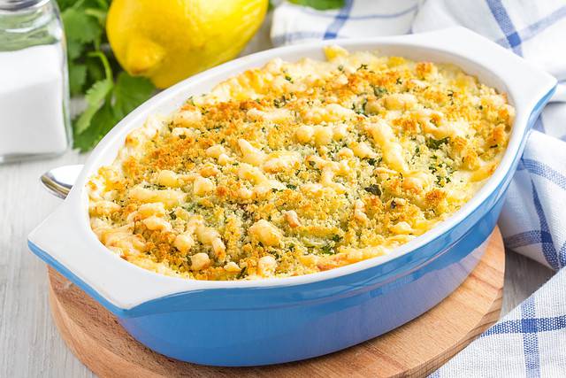 Casserole with crispy crumble, potato gratin, baked meat butter cheese dish, delicious homemade dinner