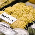 Angel hair pasta being sold at a market