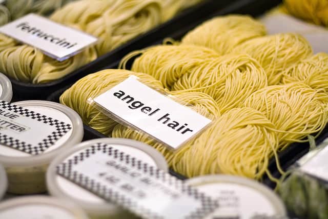Angel hair pasta being sold at a market