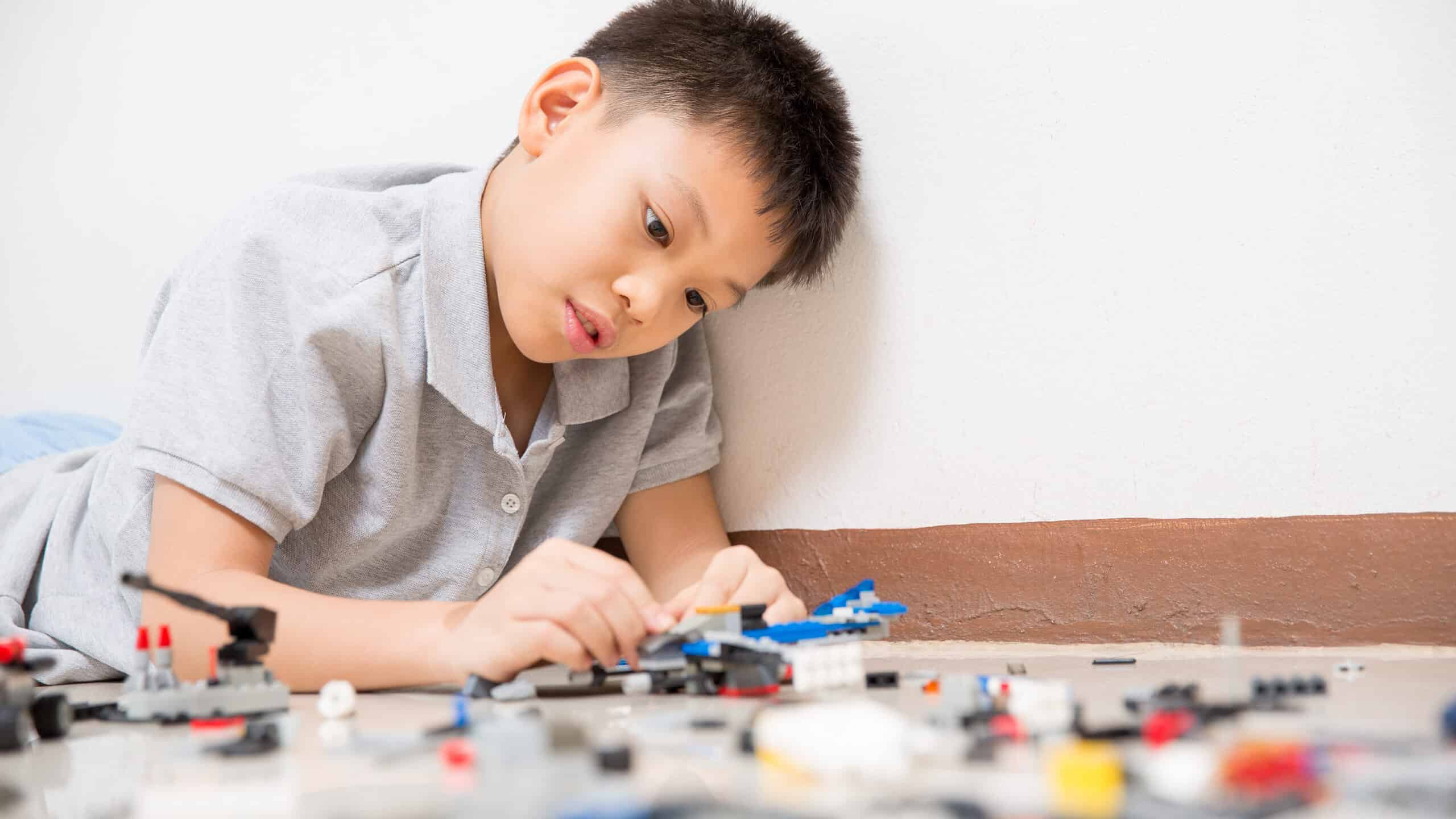 Young boy playing with blocks