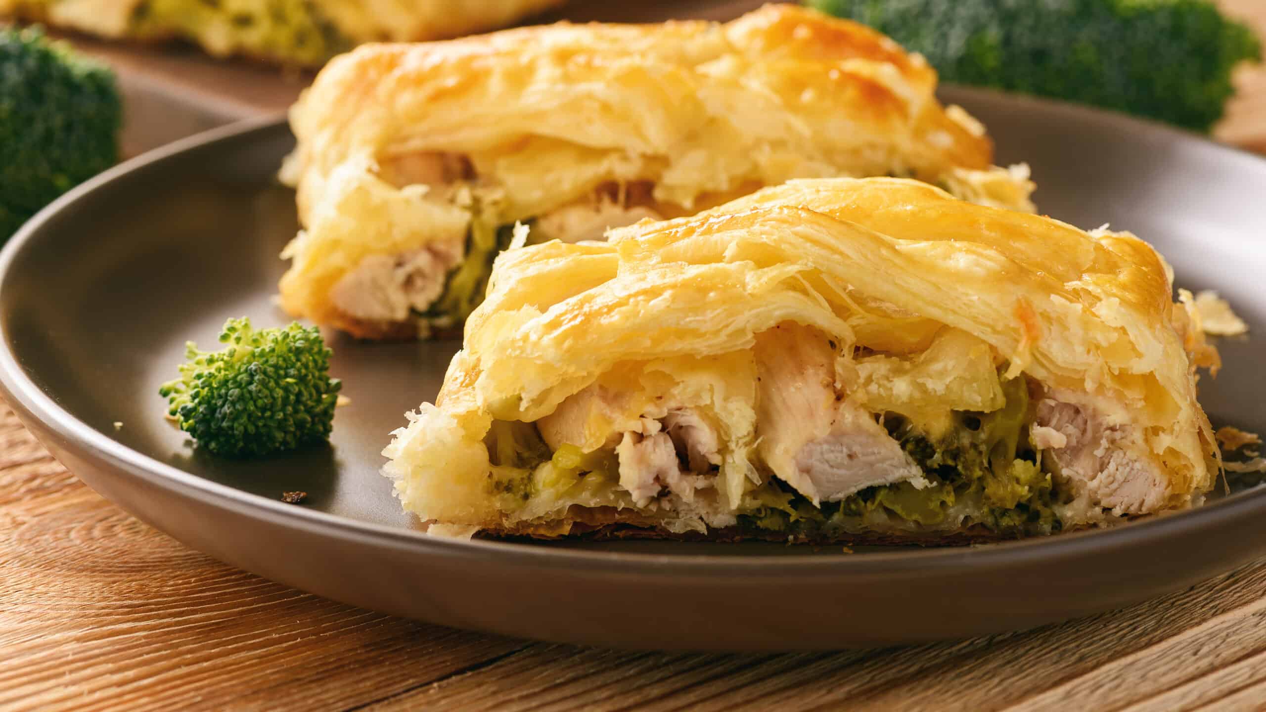 Homemade pie stuffed with broccoli, chicken and cheese.