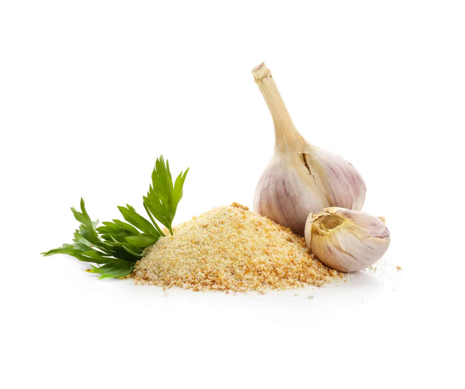 Granulated dried garlic on white background