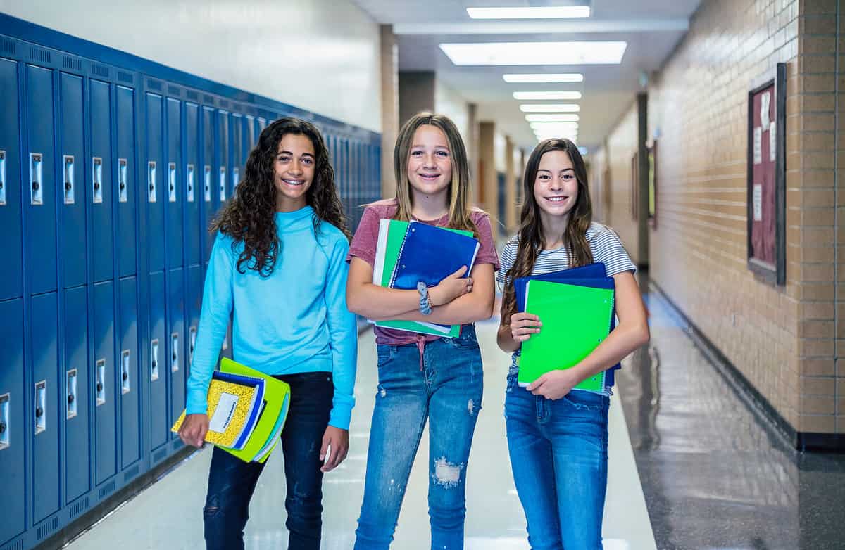 A group of students standing in the hallway of Parish Episcopal School in Dallas, Texas.