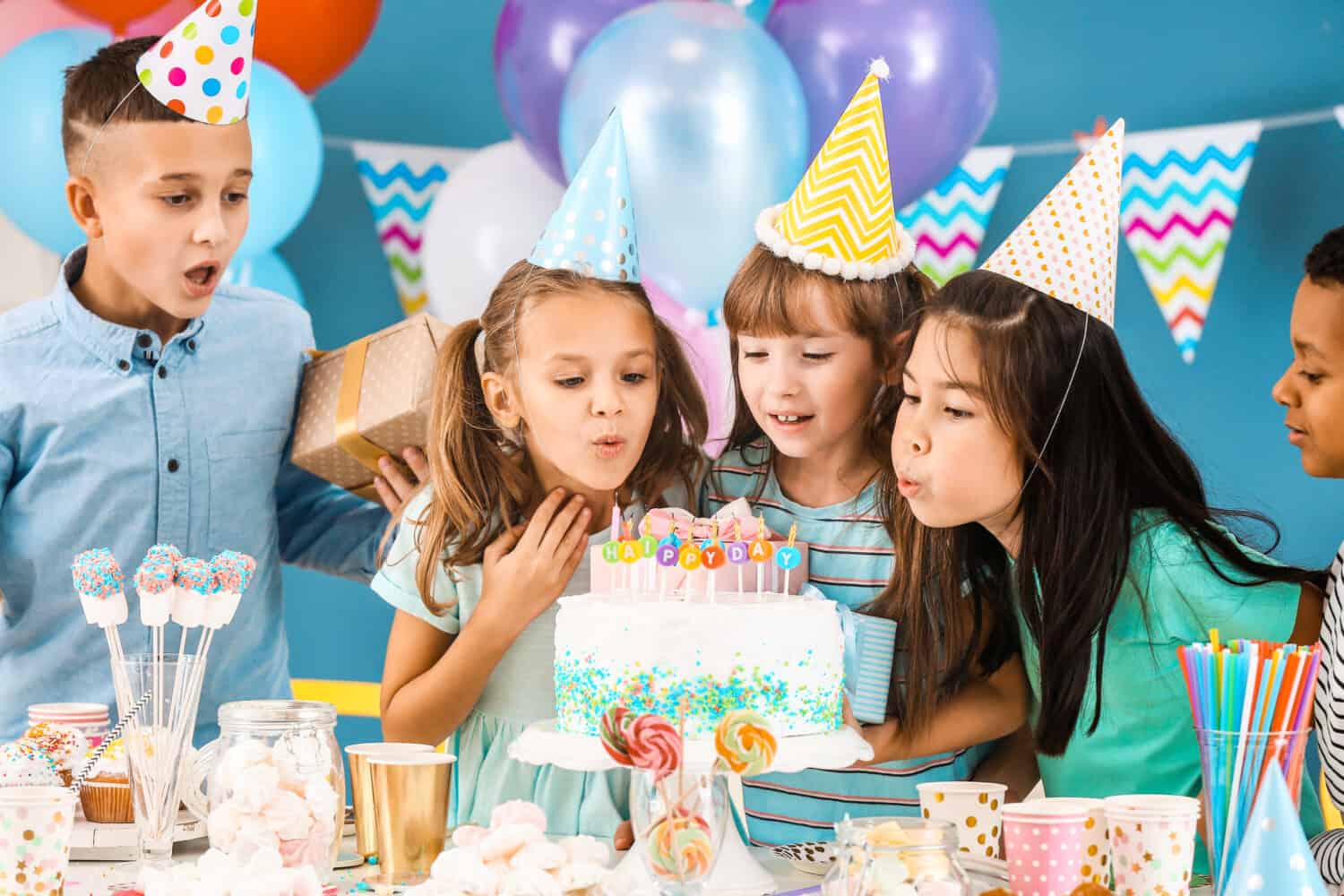 Little children celebrating Birthday at home