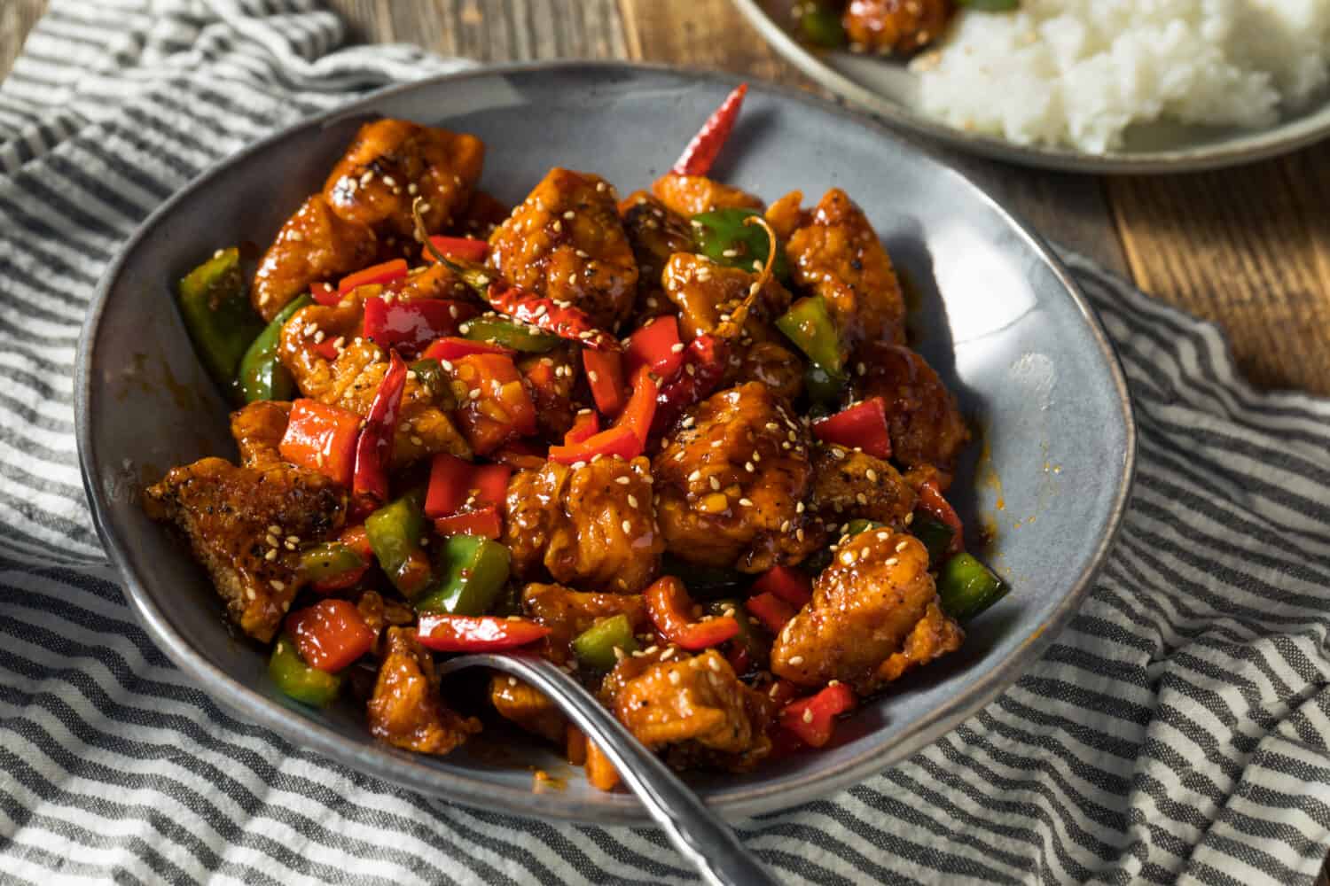 Homemade Spicy Szechuan Chicken with Peppers and Rice