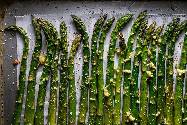 Oven roasted asparagus on sheet pan.