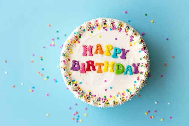 Happy birthday cake with rainbow lettering