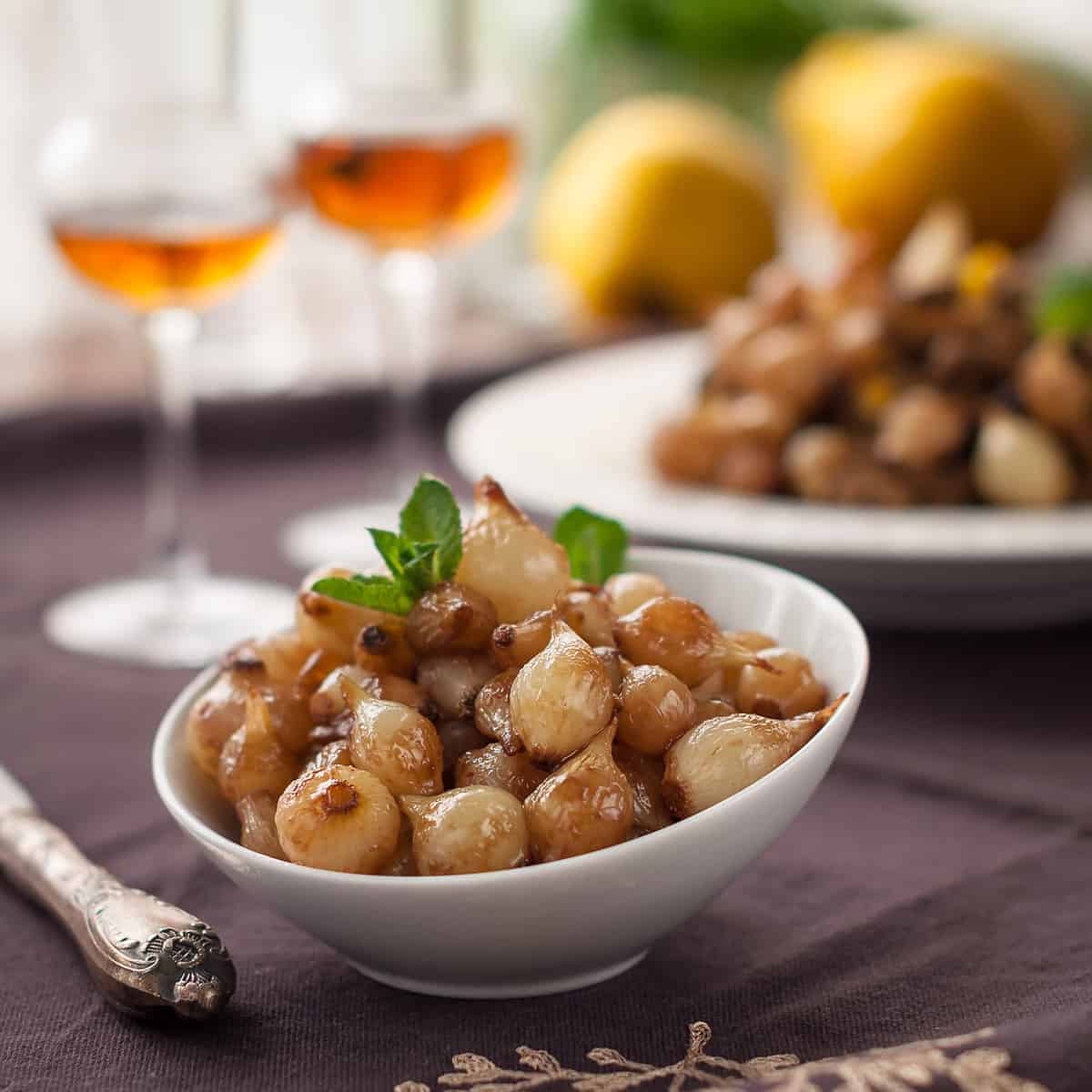 Savory Glazed Pearl Onions in White Bowl