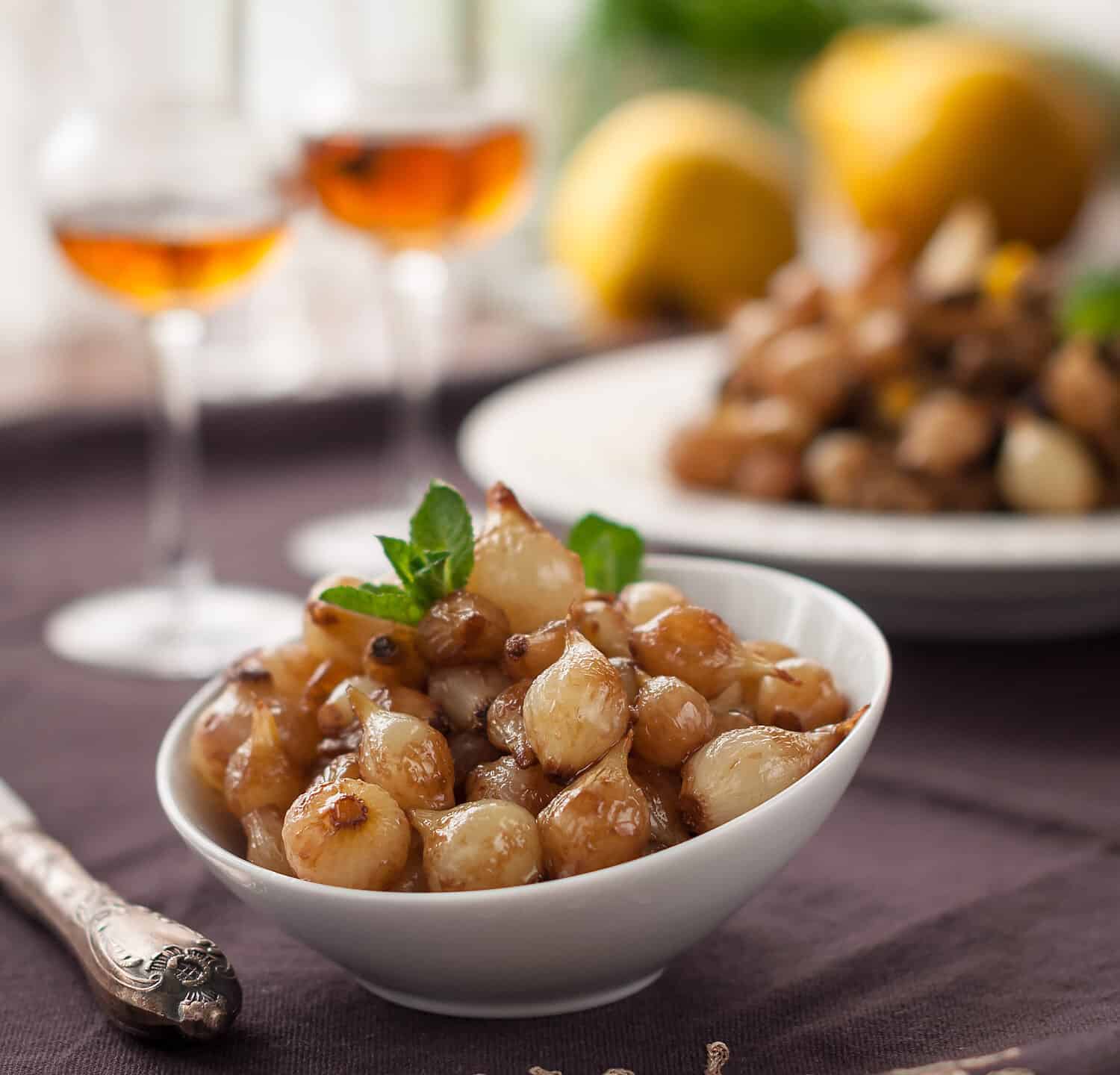 Savory Glazed Pearl Onions in White Bowl