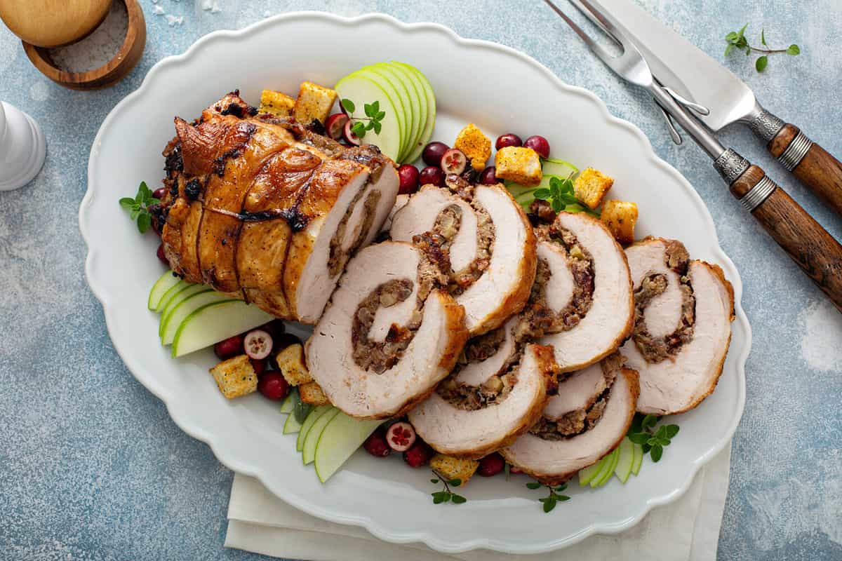 Pork loin roasted filled with cranberry bread stuffing