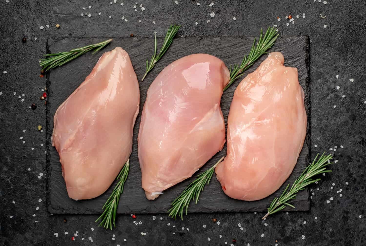 chicken fillet on a stone background