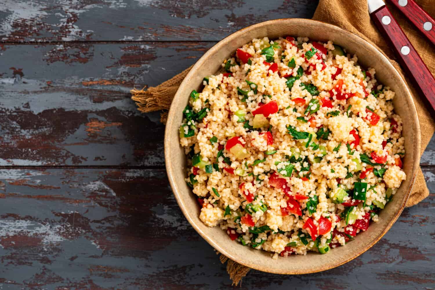 Create a healthy and balanced meal with this couscous vegetable salad.